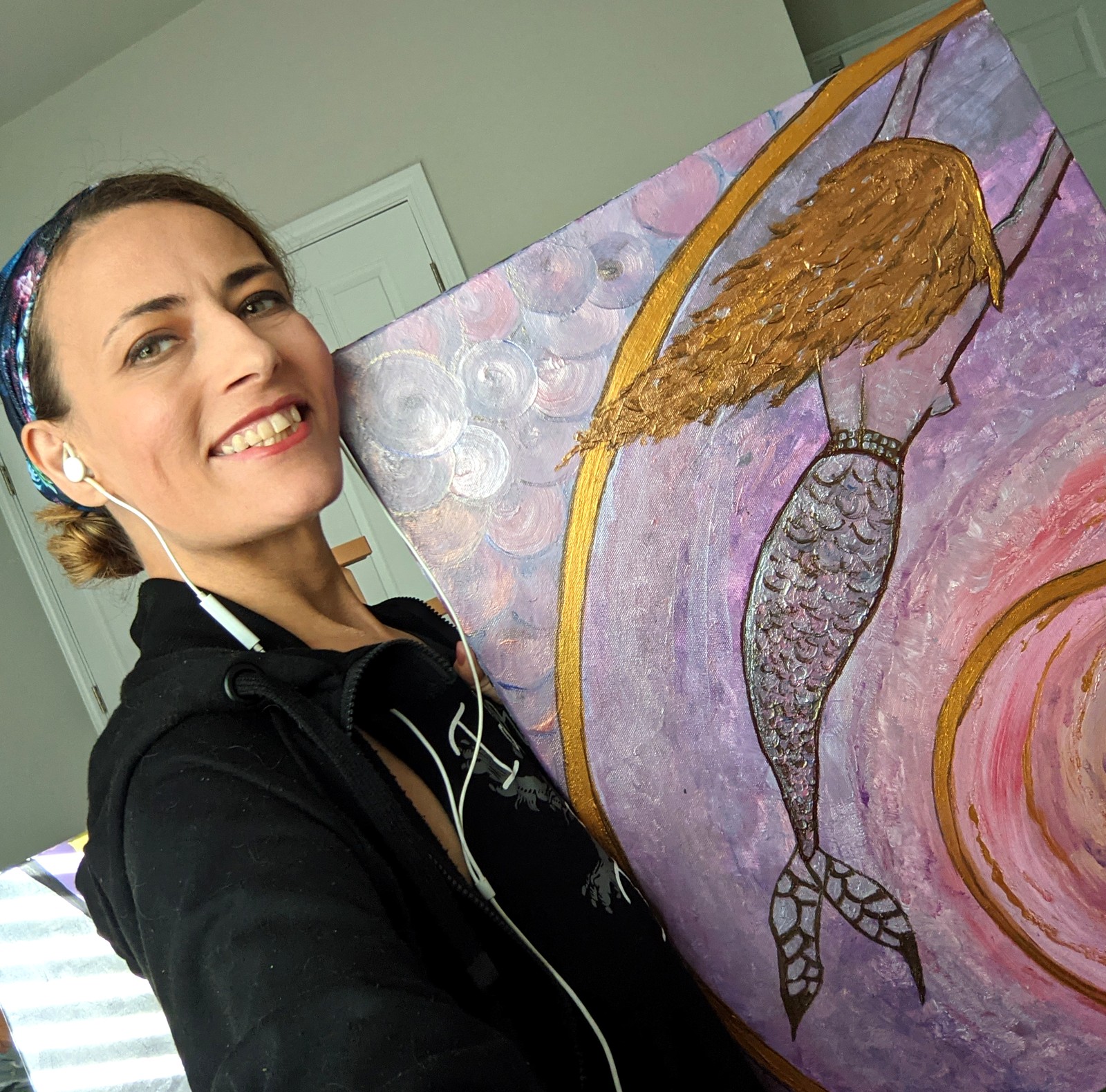 Elisa holding The Mermaid